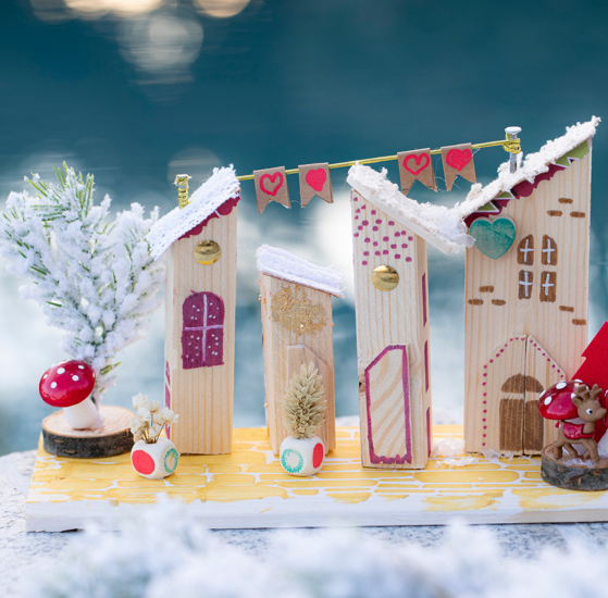 Petits châlets en bois dans une ambiance hivernale